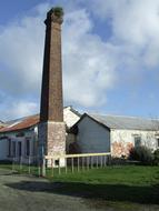 old building with a high chimney in new zealand