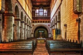 wooden benches in catholic church