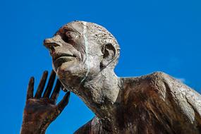 listening bronze statue
