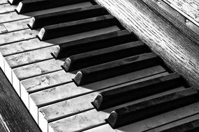 damaged keys of an old piano