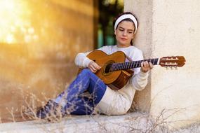 Girl with Guitar on street