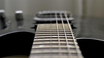 electric guitar fretboard close up