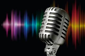 vintage silver microphone on colorful background