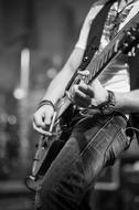 black and white, musician playing electric guitar