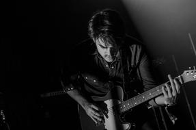 guitarist Man in dark