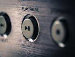 Play button on board of player