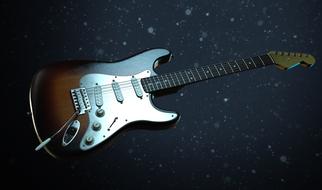 Electric Guitar at abstract dark background