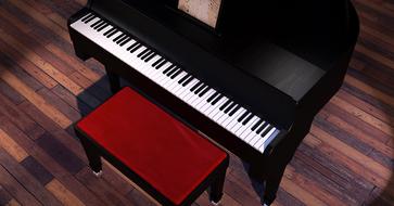 painted black piano and red bench