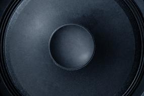 round black speaker macro photo