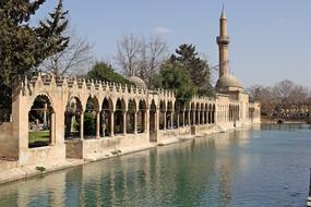 mosque on shore of BalÄ±klÄ± gÃ¶l, holy lake, turkey, urfa