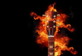 fiery guitar on a black background