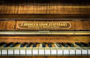 antique Piano, detail, label above Keys