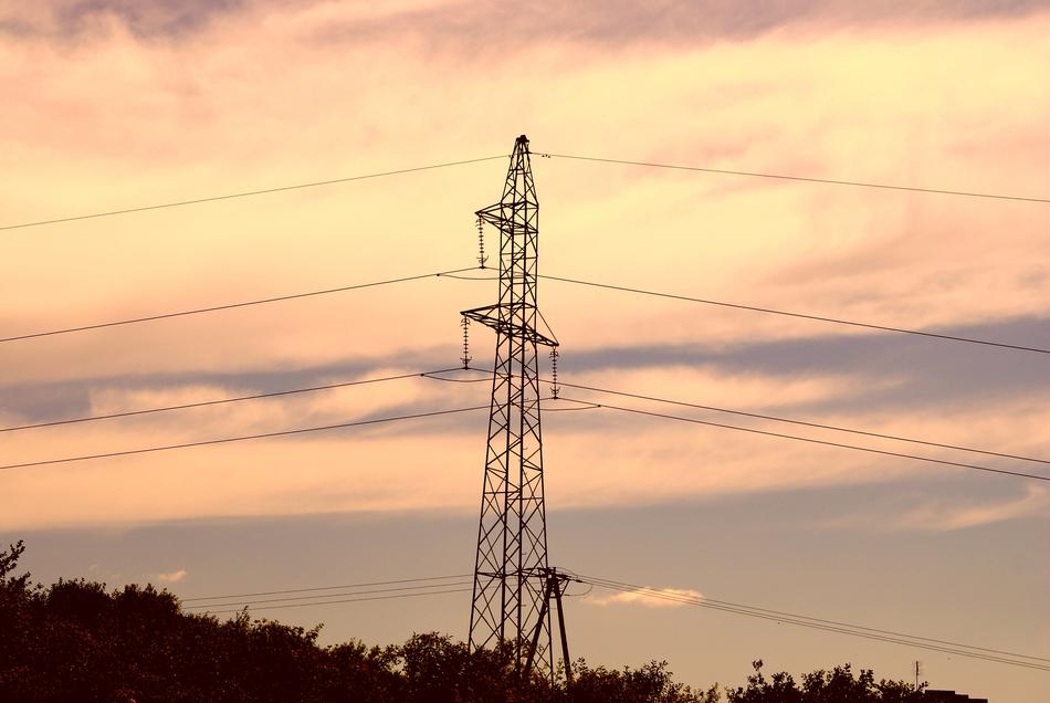 transmission lines in the evening sky