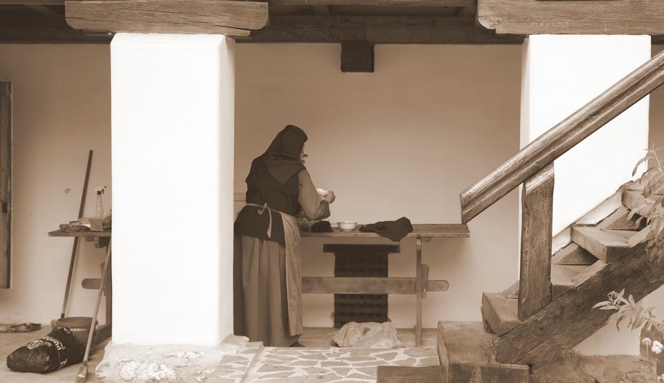 woman in rural monastery