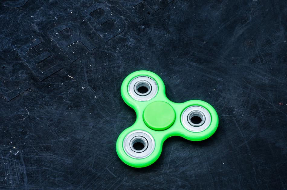 green spinner on dark