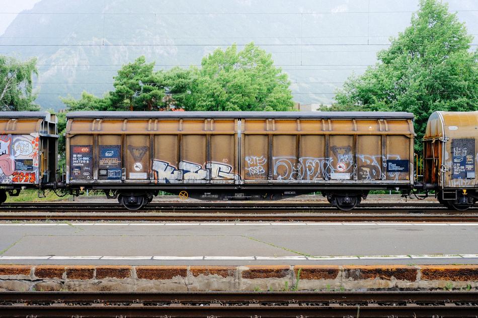 graffiti on railway cars with coal