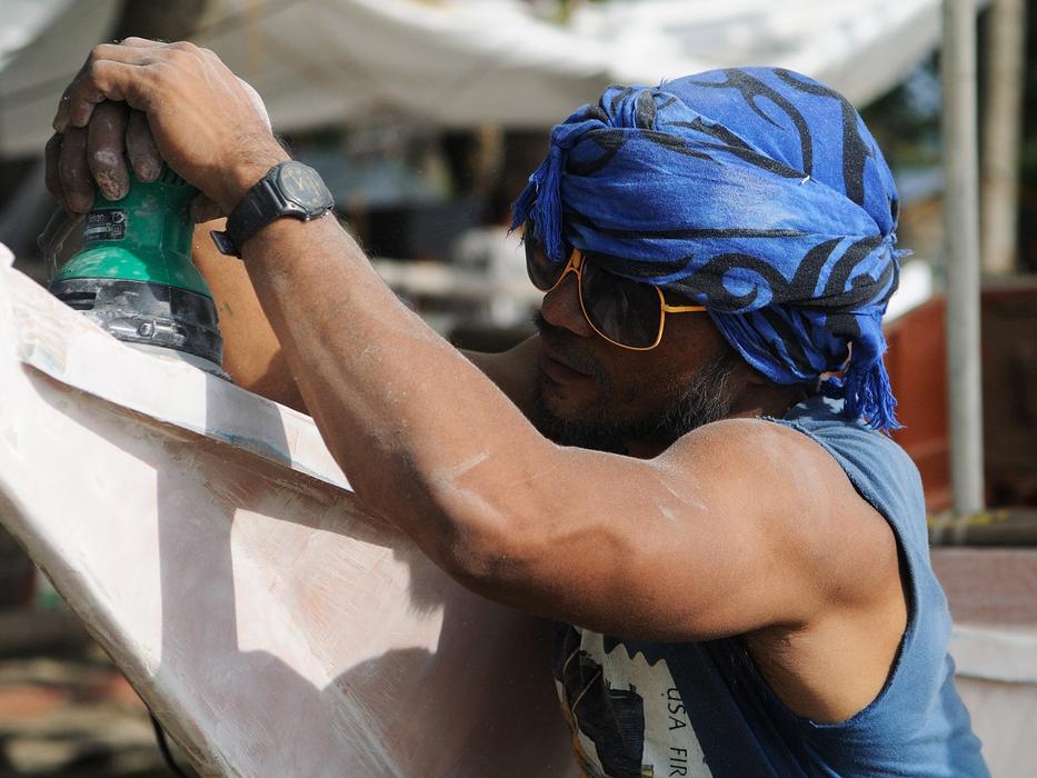 working man on blurred background