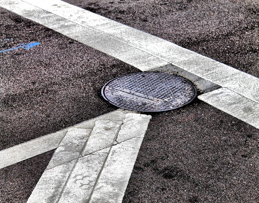 Close-up of the white lines, on the road