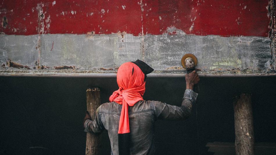 man at work near the wall