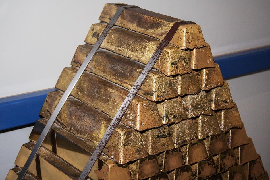Stacks of the shiny, yellow brass bars