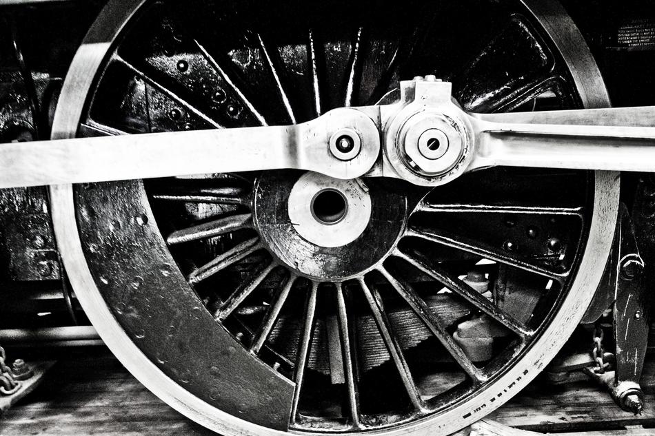 wheel of vintage railroad transport in black and white background
