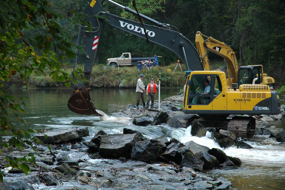 excavator on the water