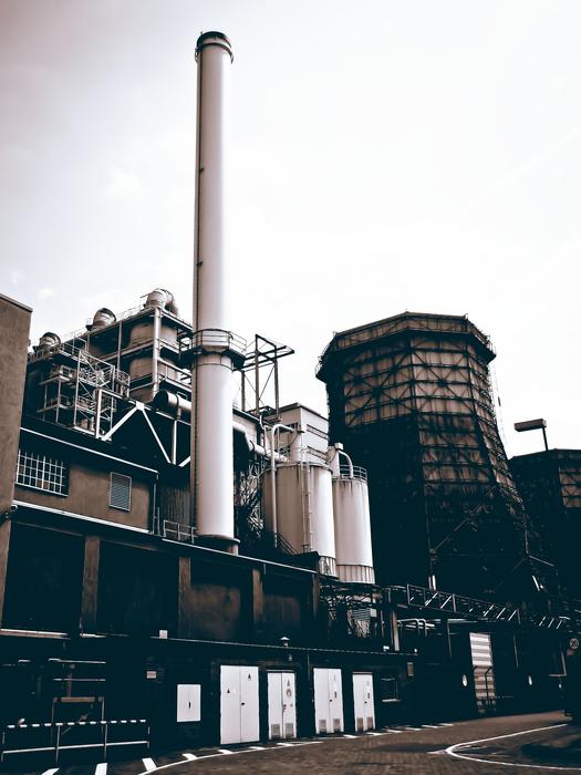 Old photo of the old factory with chimney