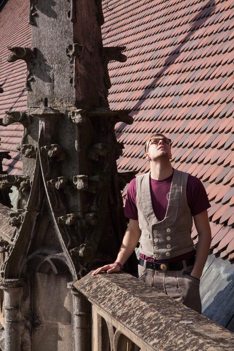 restorer on the roof of the ulm cathedral
