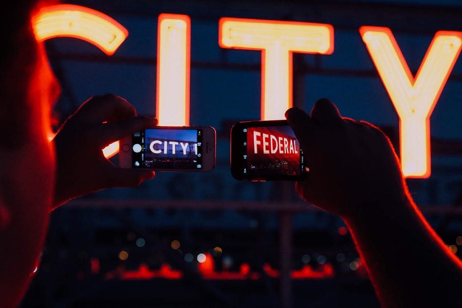 gadgets in hands in the dark