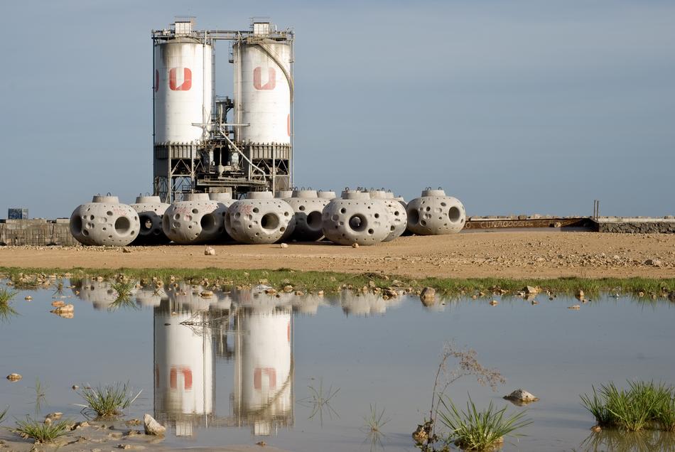 reflection of water tanks in the lake