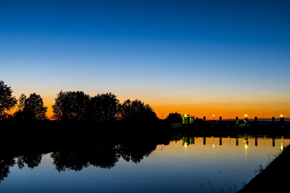 river dam at dusk during sunset