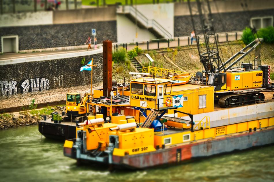 Colorful dredgers on the green water, in the port of DÃ¼sseldorf, Germany