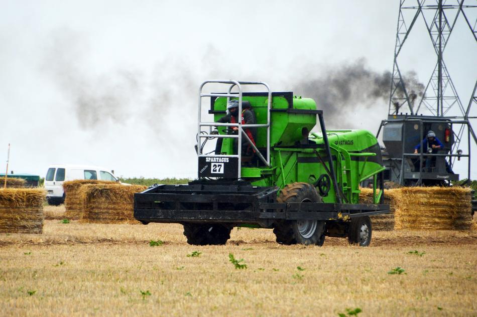 Combine Harvesters Race on Farm