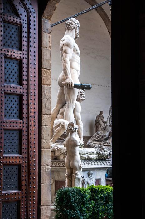 sculpture behind the door