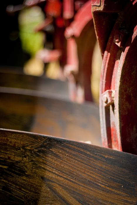 tractor parts in blurred background