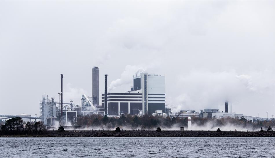 smoke over Industrial plant on waterside