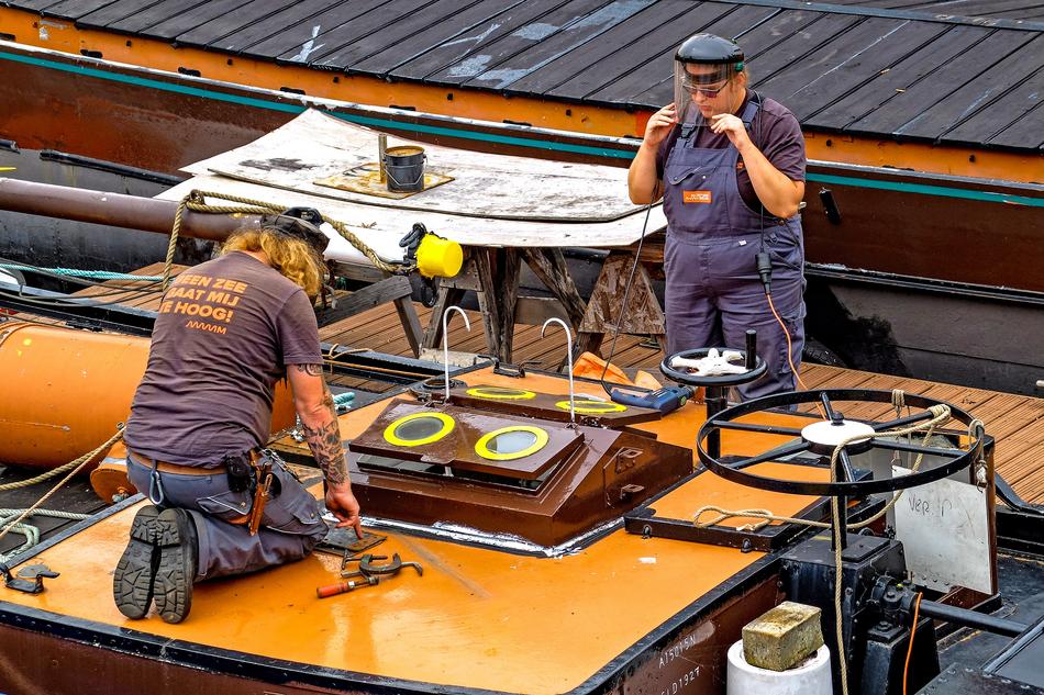 Workers on Barge Houseboat