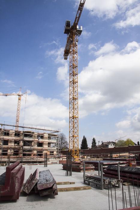 crane at a construction site under the blue sky