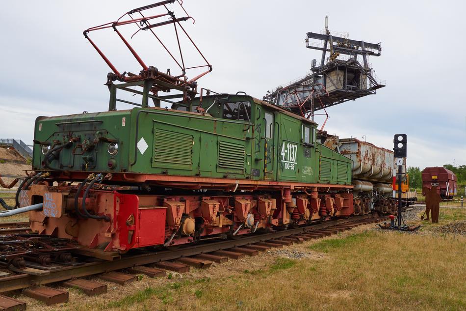 Brown coal from open pit mining on the green and orange train