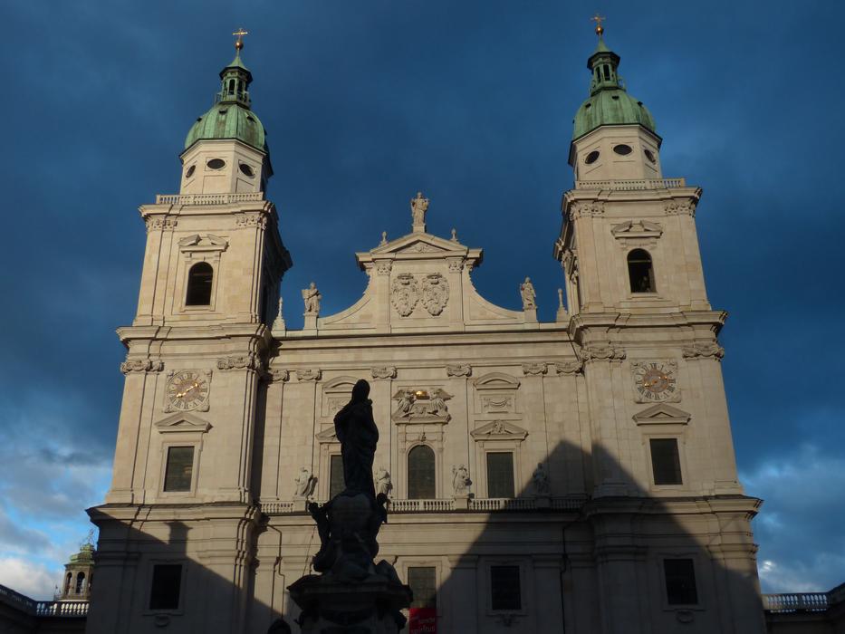 salzburg cathedral on the background of dark clouds