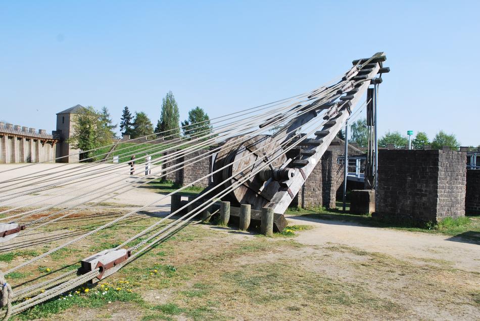 Close-up of the old tool, among the constructions and colorful nature