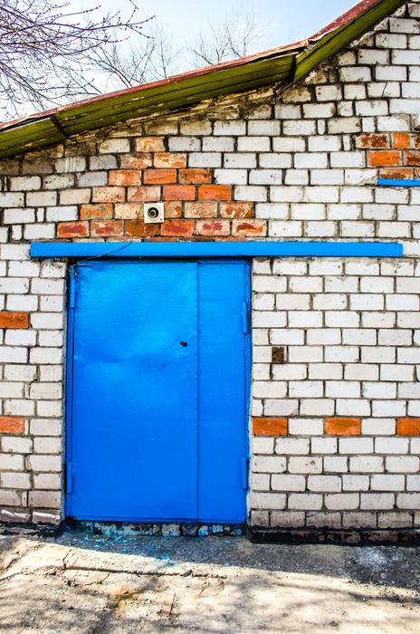 Blue door, of the old, colorful warehouse