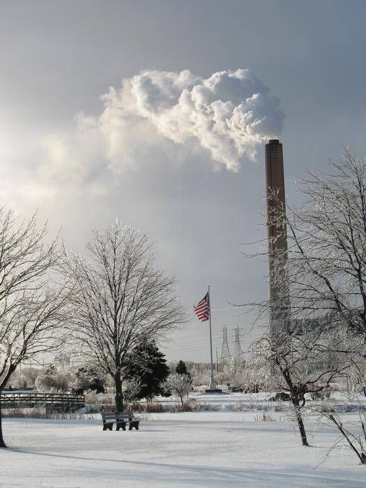 the chimney of the plant pollutes the environment, winter