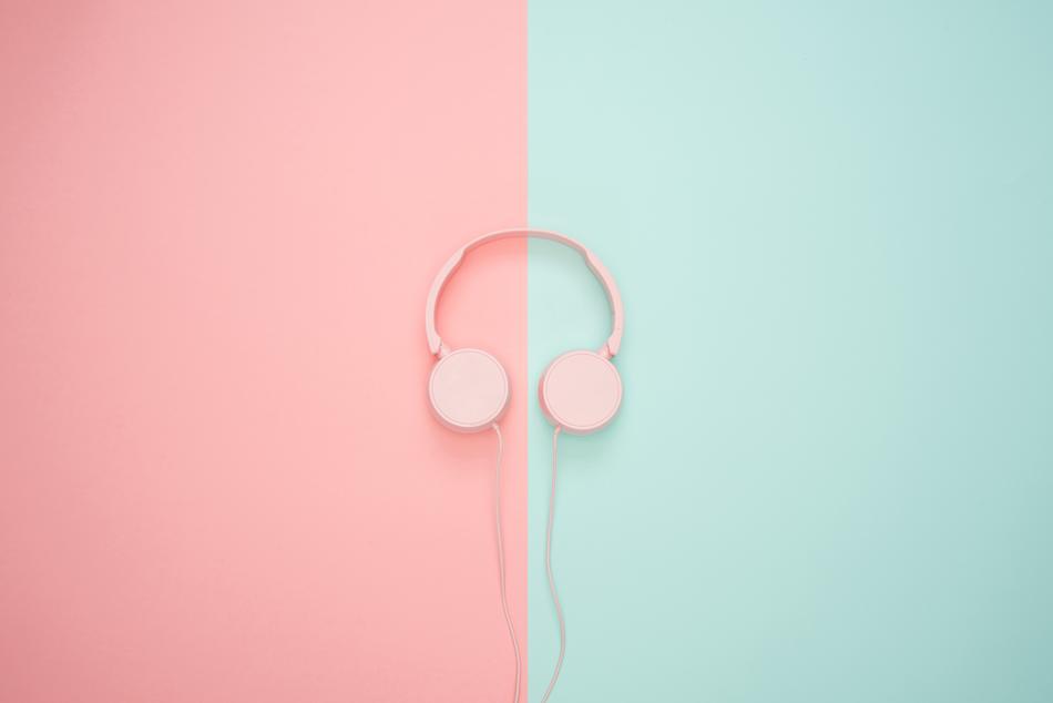 Beautiful, pink headphones, at pink and turquoise background