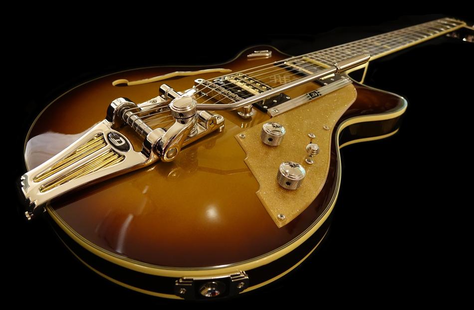 rock guitar on the black background