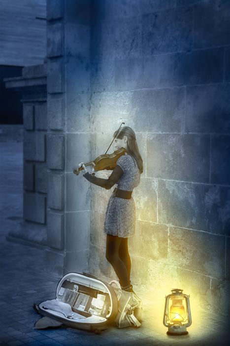 girl plays on a strip at night on the street