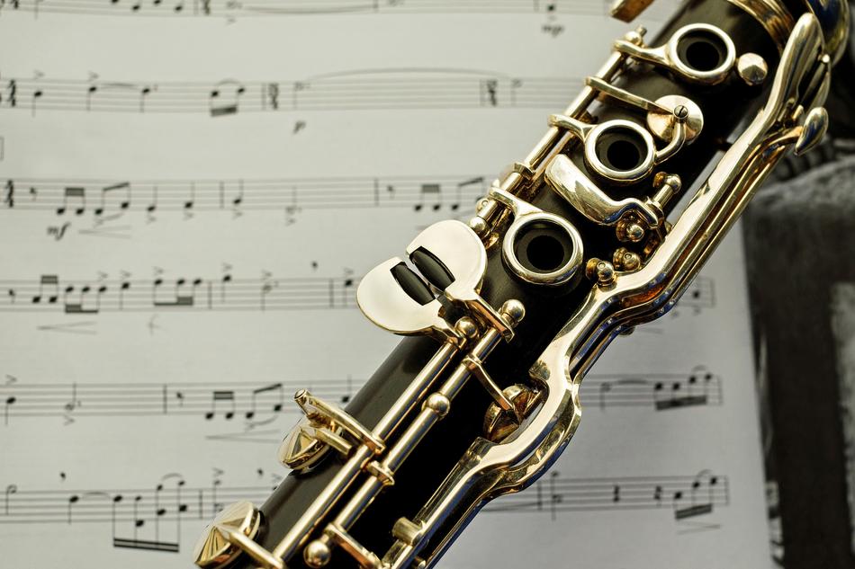 Clarinet over Music sheet