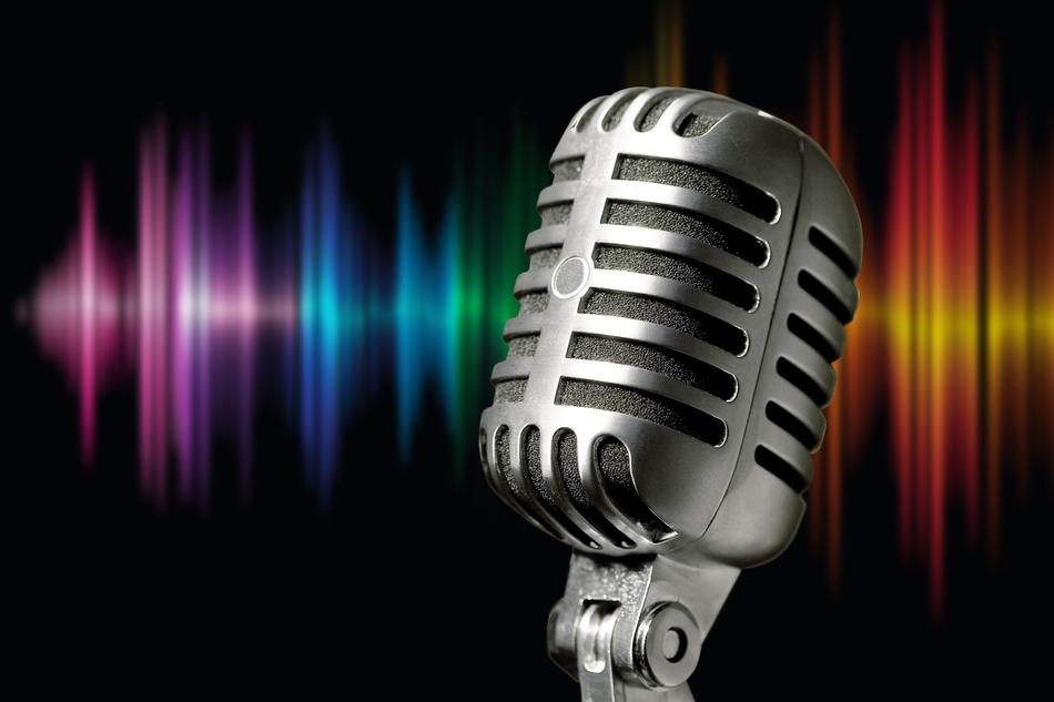 vintage silver microphone on colorful background