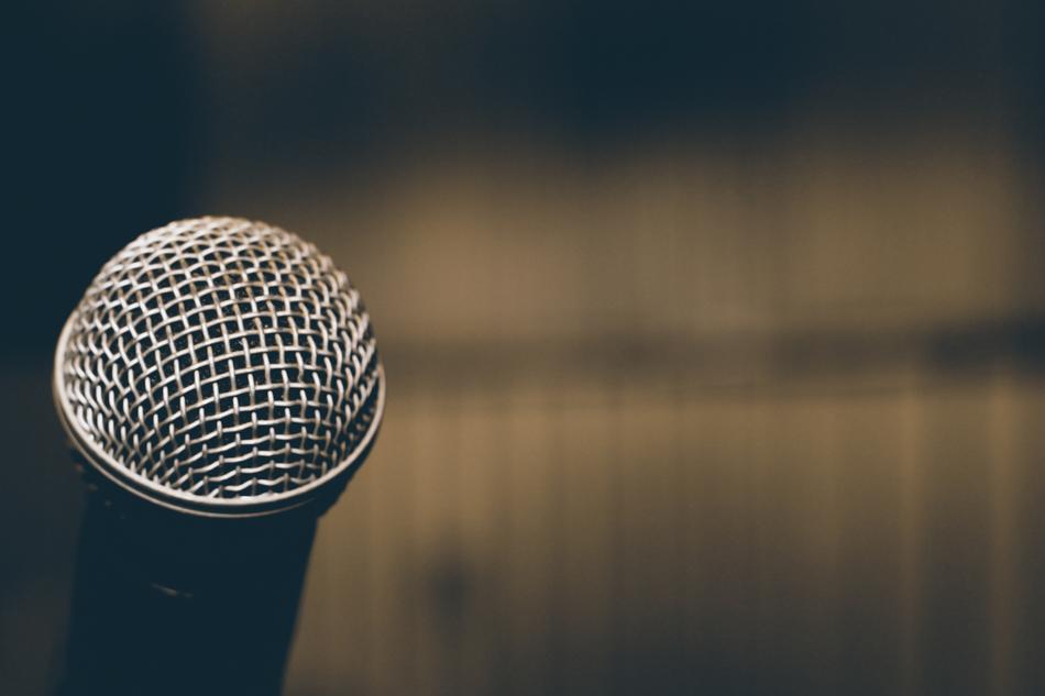 Steel audio microphone at blurred background