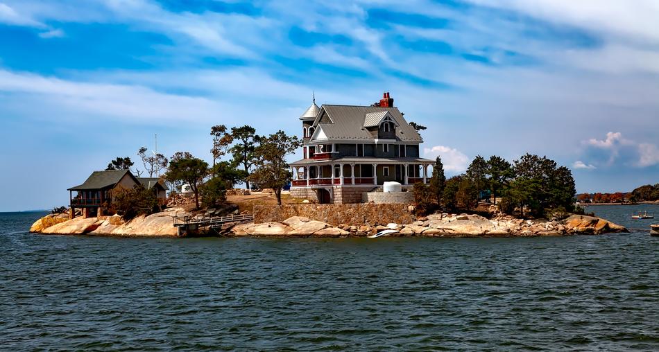 photo of a villa on a small island